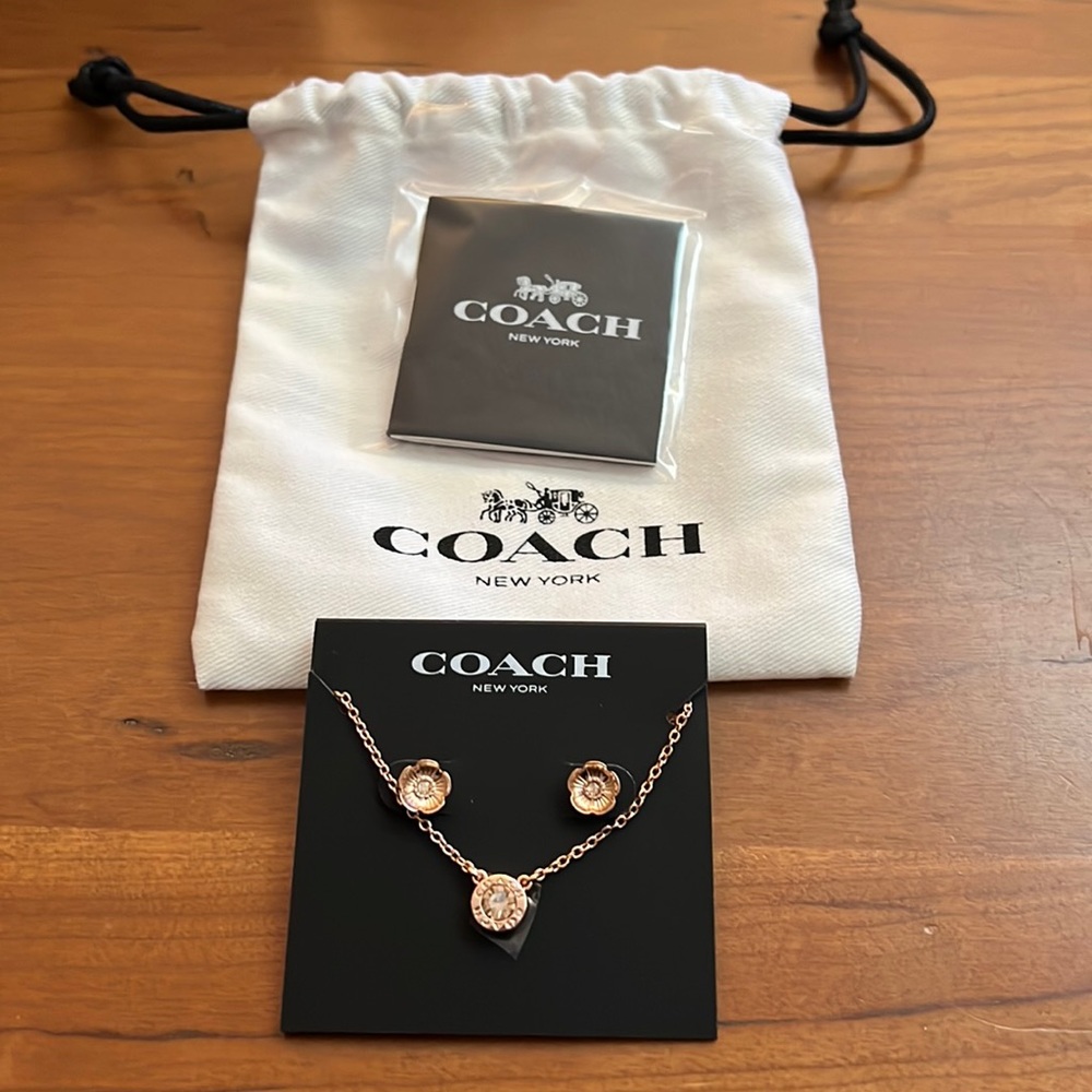 NWT Coach necklace and post earrings in rose gold color